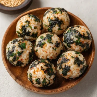 Delicious Korean Rice Balls (Jumeokbap) served with colorful ingredients