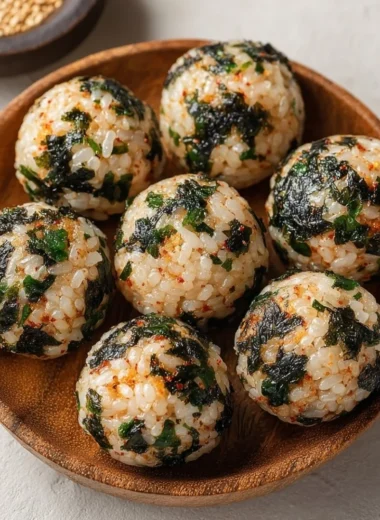 Delicious Korean Rice Balls (Jumeokbap) served with colorful ingredients