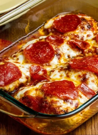 Low-carb pepperoni pizza chicken bake served on a plate