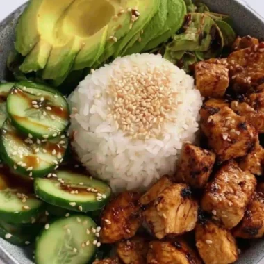 Delicious rice bowl with colorful vegetables and protein toppings