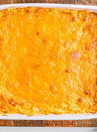 Cheesy Creamy Buffalo Chicken Dip served in a bowl with crackers