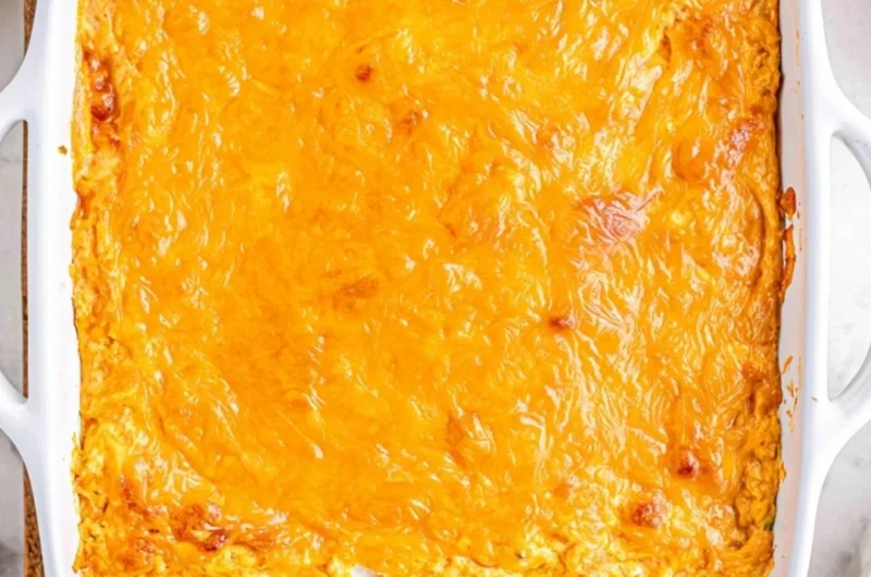 Cheesy Creamy Buffalo Chicken Dip served in a bowl with crackers