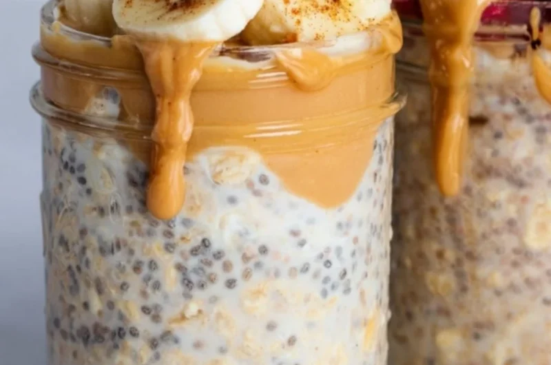 Bowl of high-protein overnight oats topped with fruits and nuts