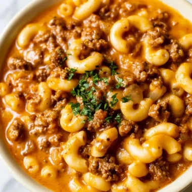 Delicious homemade hamburger helper served in a bowl with a spoon