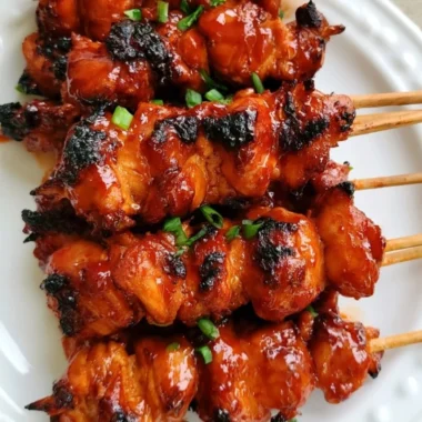 Delicious Korean chicken skewers grilled to perfection with vibrant marinade