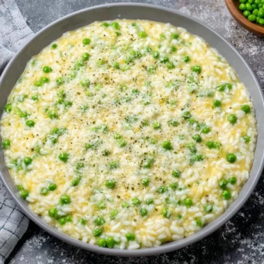 Delicious plate of rice and peas served with fresh herbs and spices.