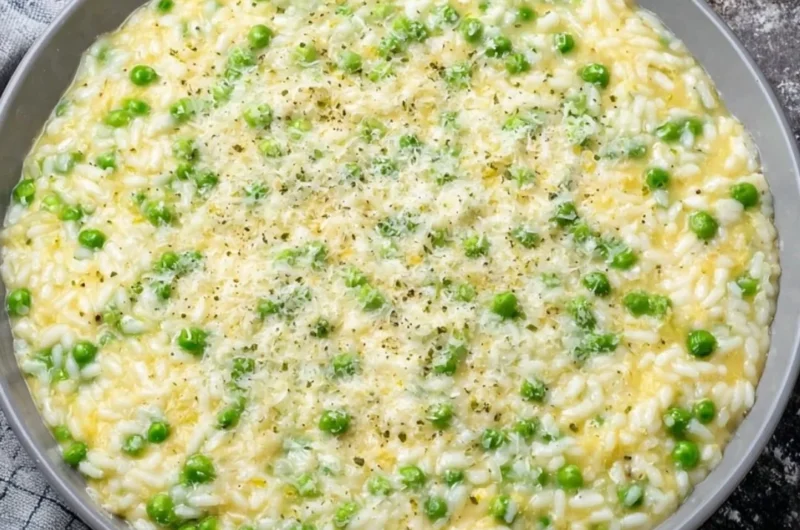 Delicious plate of rice and peas served with fresh herbs and spices.