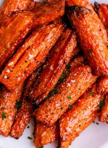 Air fryer carrots drizzled with honey garlic butter, a delicious side dish