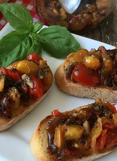 Bruschetta in a Jar with fresh tomatoes and basil ready to serve