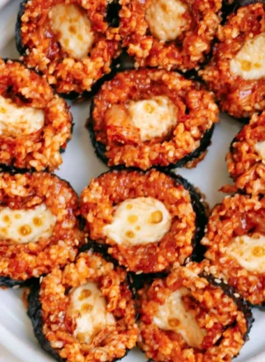 Cheese Kimchi Kimbap with spicy kimchi and melting cheese in a rice roll
