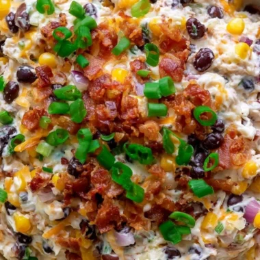 Delicious bowl of Cowboy Corn Dip ready for serving at a party.