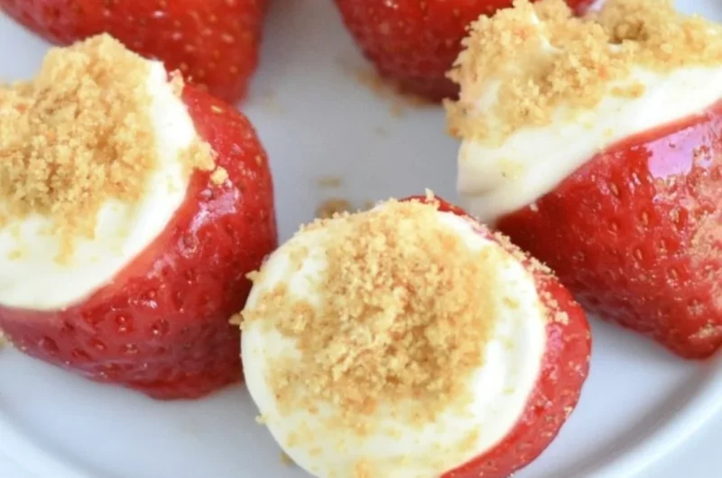 Delicious no-bake strawberry cheesecake bites on a plate