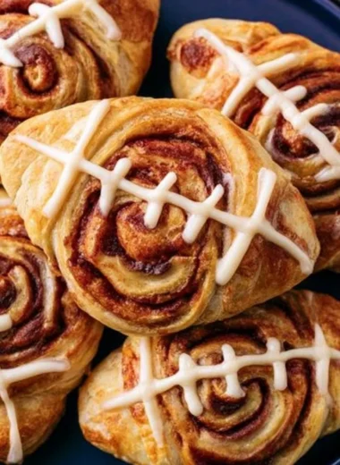 Delicious football-shaped cinnamon rolls for game day celebrations