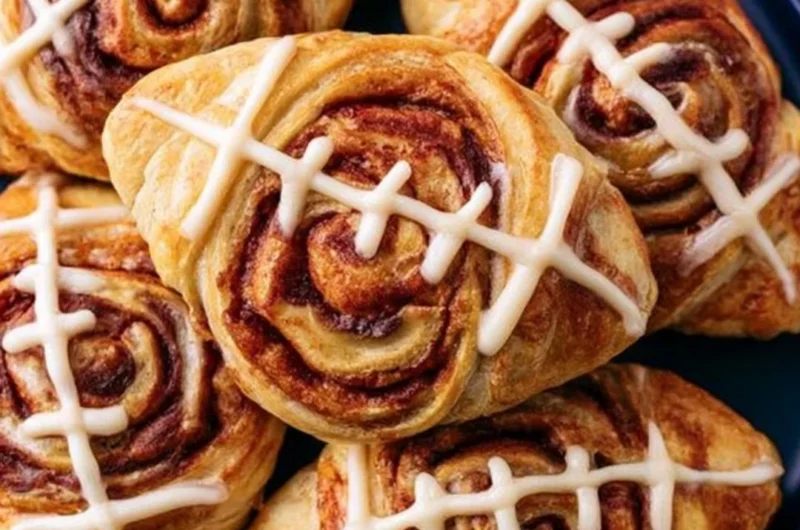 Delicious football-shaped cinnamon rolls for game day celebrations