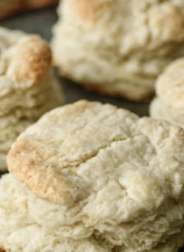 Homemade buttery biscuits fresh out of the oven, golden and flaky.