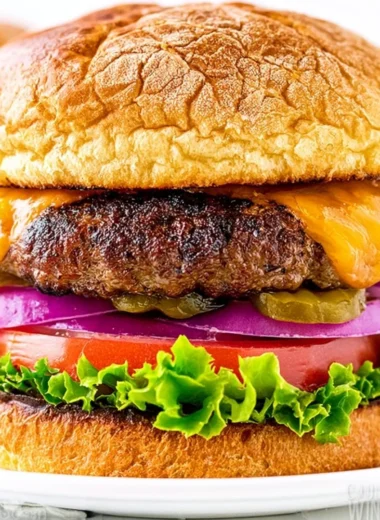 Delicious homemade juicy burger served with fresh toppings