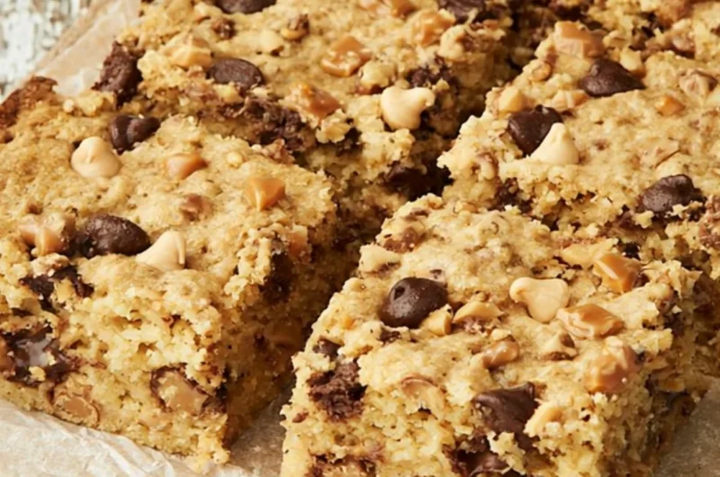 Loaded chocolate chip cookie bars with melted chocolate