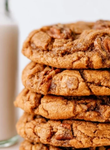 Freshly baked Maple Pecan Cookies on a wooden table