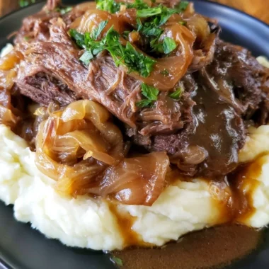 Delicious melt in your mouth pot roast served with vegetables