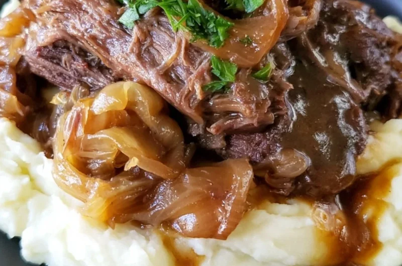 Delicious melt in your mouth pot roast served with vegetables