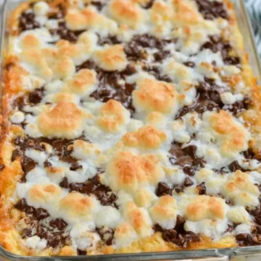 Delicious S'mores Magic Bars with chocolate, graham crackers, and marshmallows.