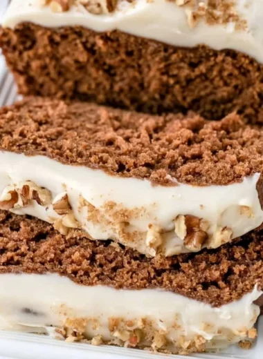 Slice of delicious homemade gingerbread loaf inspired by Starbucks