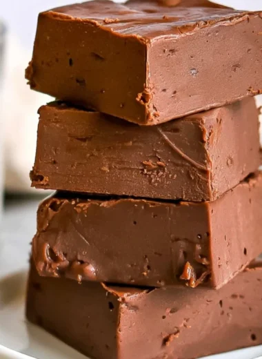 Easy 3 ingredient chocolate fudge made with rich chocolate and a smooth texture.