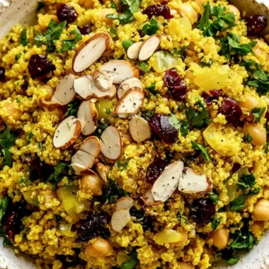Moroccan-inspired chickpea quinoa salad with vibrant vegetables and spices