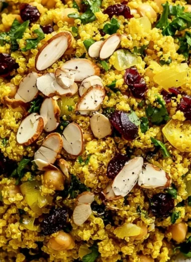 Moroccan-inspired chickpea quinoa salad with vibrant vegetables and spices