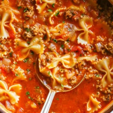 Delicious One-Pot Lasagna Soup served in a bowl with fresh herbs