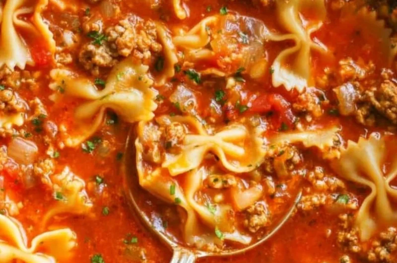 Delicious One-Pot Lasagna Soup served in a bowl with fresh herbs