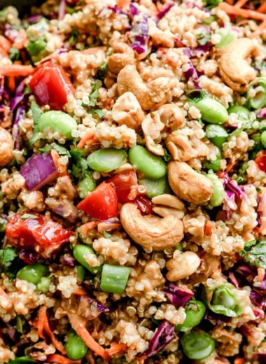 Delicious Thai Quinoa Salad with fresh vegetables and dressing.