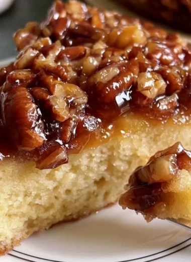 Delicious upside down caramel pecan cake with a rich caramel glaze and pecans.