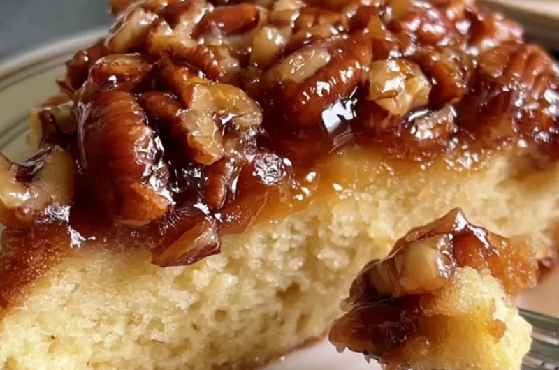 Delicious upside down caramel pecan cake with a rich caramel glaze and pecans.
