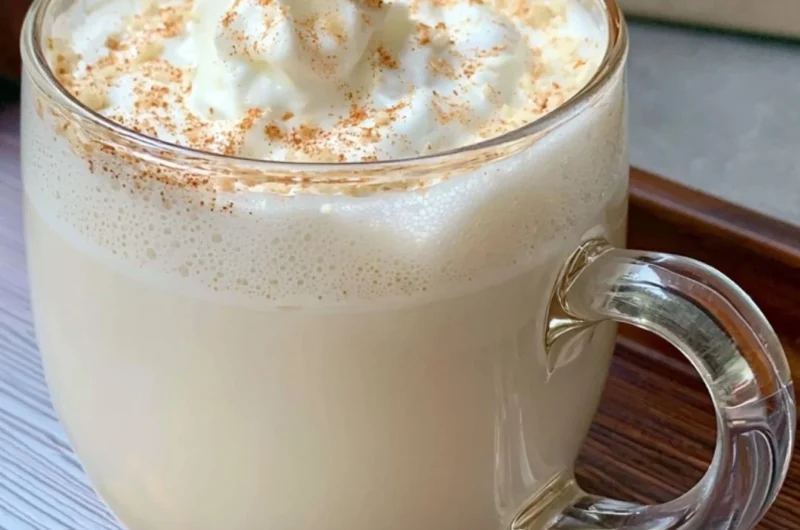 Vanilla Almond Snowflake Latte topped with whipped cream and almonds.