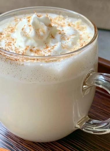 Delicious Vanilla Almond Snowflake Latte topped with whipped cream and almonds