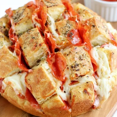 Pepperoni pizza pull-apart bread appetizer served on a platter