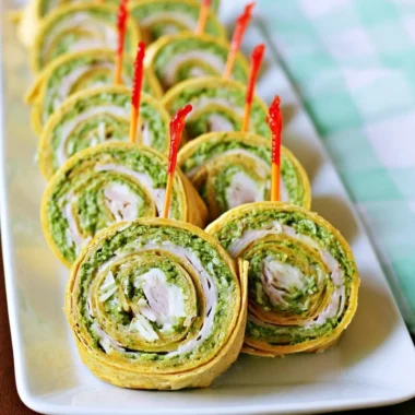 Pesto tortilla pinwheels served as a colorful and appealing appetizer.