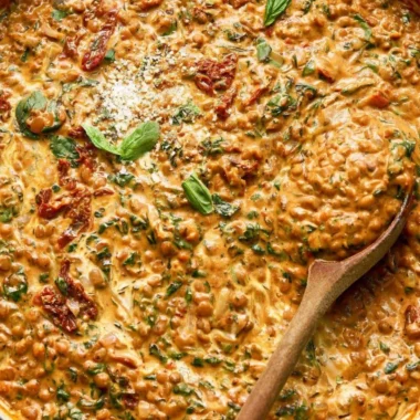 Creamy Marry Me Lentils dish with brown lentils, cream, and spinach